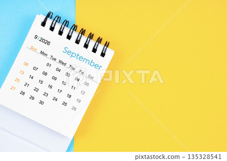 September 2026, Monthly desk calendar for 2026 year on yellow and blue background. September 2026, Monthly desk calendar for 2026 year on yellow and blue background. 135328541