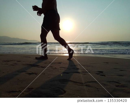 Morning run on the beach in Da Nang at sunrise 135330420