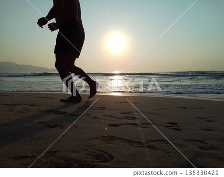 Morning run on the beach in Da Nang at sunrise 135330421