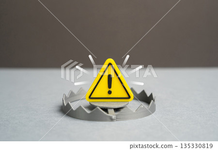 A warning sign above a trap. A warning of a trap and danger. Finance and technology risks, hidden threats, poor decisions and the need for awareness and preventive risk management A warning sign above a trap. A warning of a trap and danger. Finance and technology risks, hidden threats, poor decisions and the need for awareness and preventive risk management 135330819