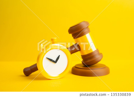 The judge's gavel and stopwatch. A verdict of temporary restraint. Probation, conditional release. Justice timing concept, legal limits and supervision period. The judge's gavel and stopwatch. A verdict of temporary restraint. Probation, conditional release. Justice timing concept, legal limits and supervision period. 135330839