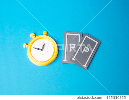 Parking spaces and stopwatch. Parking restrictions for customers and visitors. Time limited access, urban regulation and traffic control. Managing turnover, convenience and fair use of public space Parking spaces and stopwatch. Parking restrictions for customers and visitors. Time limited access, urban regulation and traffic control. Managing turnover, convenience and fair use of public space 135330855