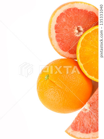 1 Title in English Sliced Fresh Oranges and Grapefruits on White Background 135331040
