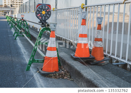 Rotating lights and single-tube barricades installed at a construction site Rotating lights and single-tube barricades installed at a construction site 135332762