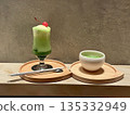 Matcha drink on a cafe table Matcha drink on a cafe table 135332949