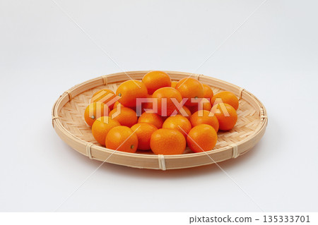 Kumquat tray basket white background Kumquat tray basket white background 135333701