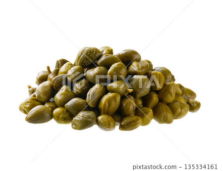 Heap of pickled caper buds isolated on white background. Pile marinated capers isolated. Heap of pickled caper buds isolated on white background. Pile marinated capers isolated. 135334161