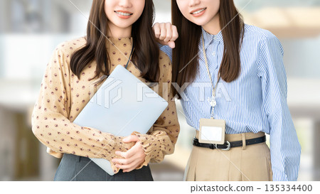 Teamwork image of two businessmen and women Teamwork image of two businessmen and women 135334400