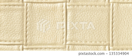 Texture light beige leather background with quilted stitched pattern, macro. Abstract cream upholstery surface Texture light beige leather background with quilted stitched pattern, macro. Abstract cream upholstery surface 135334904