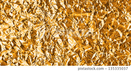 Gold foil texture with glossy crumpled surface 135335037