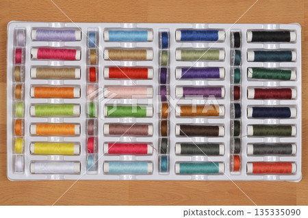 Colorful sewing threads 135335090