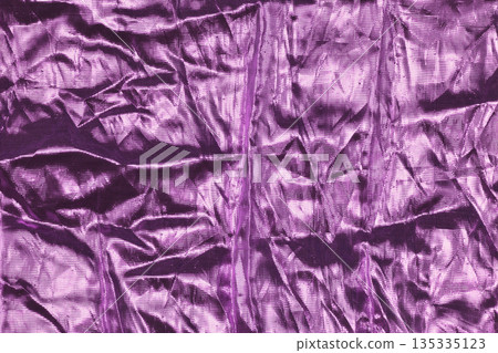 Shiny purple crumpled fabric texture Shiny purple crumpled fabric texture 135335123