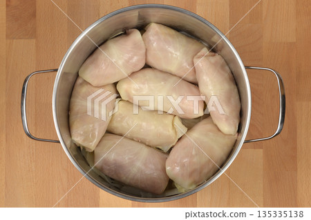 Raw sarma rolls in metal pot Raw sarma rolls in metal pot 135335138