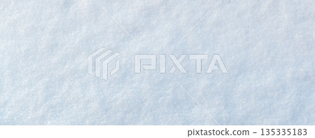 Snow-covered surface with soft shadows by trees. Snow-covered surface with soft shadows by trees. 135335183