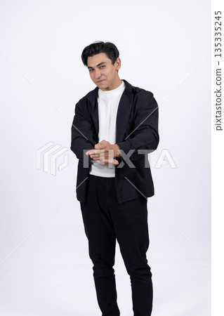 Confident man in suit posing 135335245