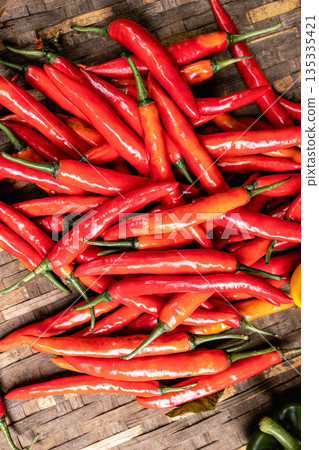 Background and texture of hot red Chinda Chili, Type of Thai chili pepper Background and texture of hot red Chinda Chili, Type of Thai chili pepper 135335421