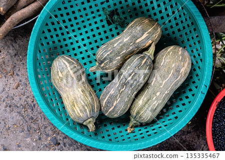 Selected focus for the pumpkin Photo of Pumpkin in the basket 135335467