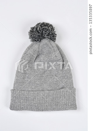 Grey winter beanie with pompom Grey winter beanie with pompom 135335897