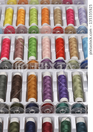 Collection of Colorful Sewing Thread Spools Collection of Colorful Sewing Thread Spools 135335925