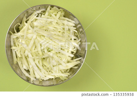Shredded Cabbage in Metal Bowl Shredded Cabbage in Metal Bowl 135335938