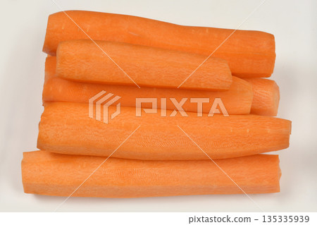 Stacked Peeled Carrots 135335939