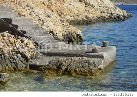 Stone pier near Skuljica cape on Krk island Stone pier near Skuljica cape on Krk island 135336182