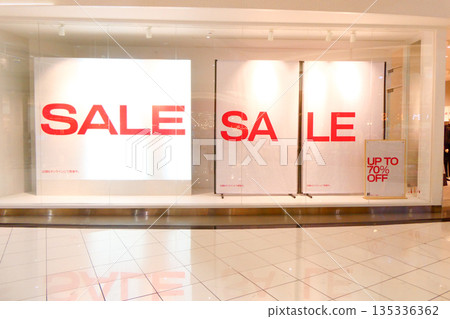 Displaying a winter clearance sale with spring items replaced Displaying a winter clearance sale with spring items replaced 135336362