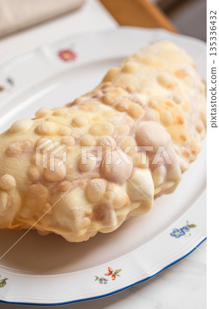 Georgian fried flatbread pastry on white plate Georgian fried flatbread pastry on white plate 135336432