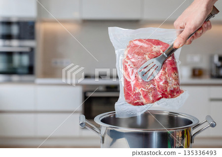 Making meat Sous-vide. 135336493