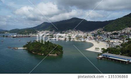Tropical mountains rising above coastal city of Angra dos Reis, Brazil 135336868