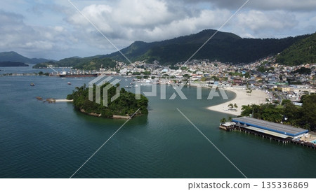 Beach and coastal town of Angra dos Reis with mountains, Brazil 135336869