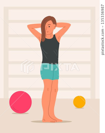 School girl doing gymnastics exercise in sports hall 135336987