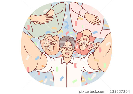 Cheerful friends take selfie together at party in nightclub, posing among falling confetti 135337294