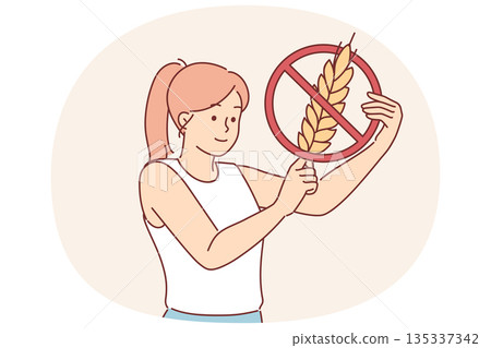 Woman holds gluten-free sign, urging people to stop eating foods containing grains and wheat Woman holds gluten-free sign, urging people to stop eating foods containing grains and wheat 135337342