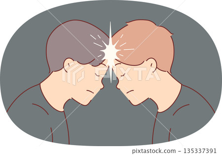 Two men brainstorm together and touch foreheads to create telepathic connection. 135337391
