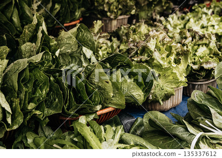Fresh Seasonal Vegetables At Traditional Market Stall: Artichokes, Beans, Cabbage, Zuccini, Potatoes, And Root Vegetables Displayed In Abundant Mediterranean Food Market Scene 135337612