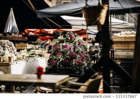 Fresh Cauliflower And Purple Cauliflower At Market Stall: Raw Seasonal Vegetables Displayed In Traditional profiling Food Market Scene Fresh Cauliflower And Purple Cauliflower At Market Stall: Raw Seasonal Vegetables Displayed In Traditional profiling Food Market Scene 135337667