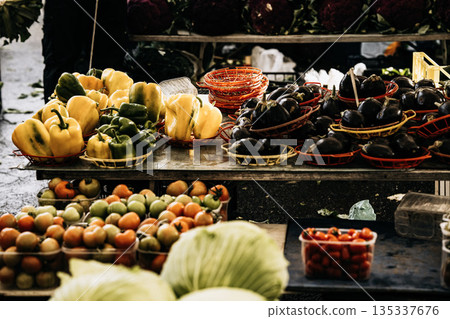 Fresh Seasonal Vegetables At Traditional Market Stall: Artichokes, Beans, Cabbage, Zuccini, Potatoes, And Root Vegetables Displayed In Abundant Mediterranean Food Market Scene 135337676