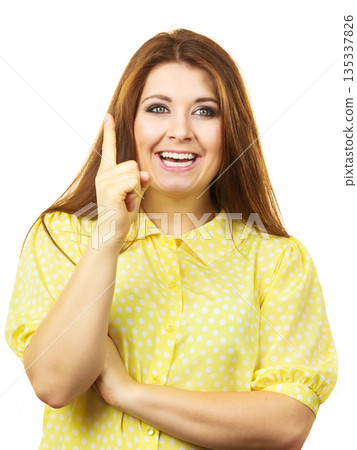Happy woman thinking wondering Happy woman thinking wondering 135337826