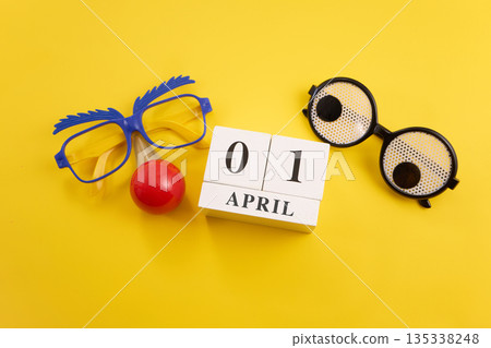 April fools' day calendar with funny glasses and clown nose April fools' day calendar with funny glasses and clown nose 135338248