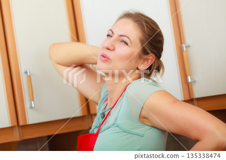 Woman suffering from backache back pain. Woman suffering from backache back pain. 135338474