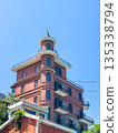 Borusan Contemporary's historic brick building showcases unique architectural details under clear blue skies. 135338794