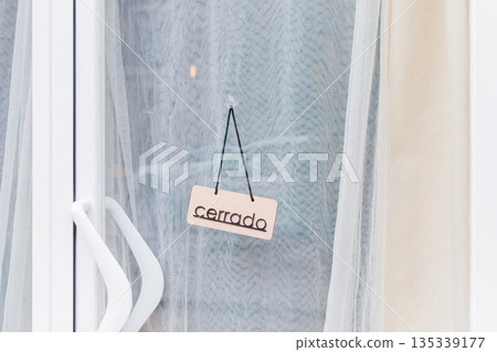 Cerrado sign on a yoga studio door Cerrado sign on a yoga studio door 135339177
