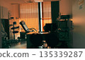 Modern gynecology examination room with medical chair and equipment 135339287