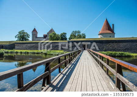 Wooden bridge leading to the main gate of the medieval Kuressaare Castle. Wooden bridge leading to the main gate of the medieval Kuressaare Castle. 135339573