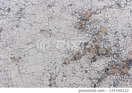 Old mat laid on the ground, background material 135340222