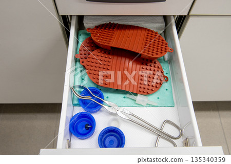 Laboratory equipment in the drawer in the laboratory. Laboratory equipment in the drawer in the laboratory. 135340359
