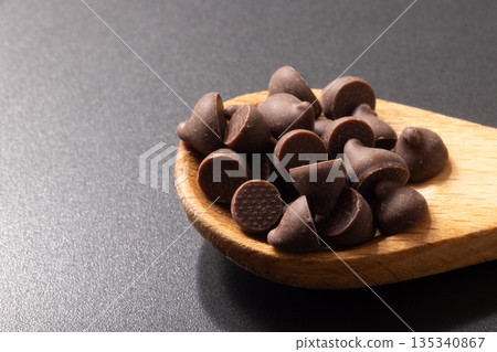 Chocolate chips, baking ingredients Chocolate chips, baking ingredients 135340867