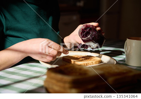 Toast With Berry Jam On Plate: A Cozy Breakfast Scene For Peanut Butter And Jelly Day 135341064