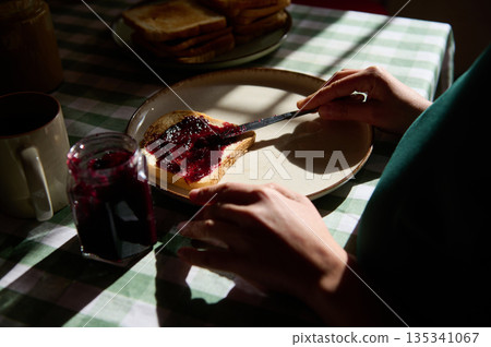 Toast With Berry Jam On Breakfast Table During Peanut Butter And Jelly Day Morning 135341067
